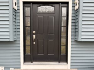 New black therma tru doors installed on a home