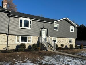 A home with grey siding in Burlington, MA