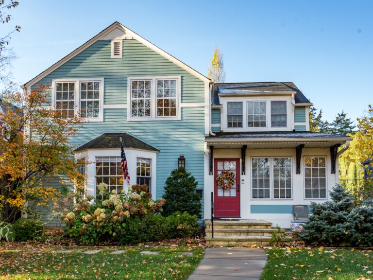 beautiful home exterior with green siding